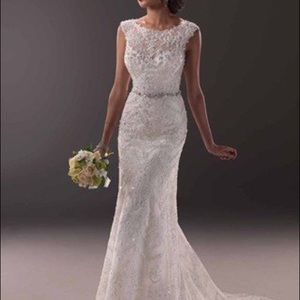 Never worn, tags still on Maggie Sottero gown